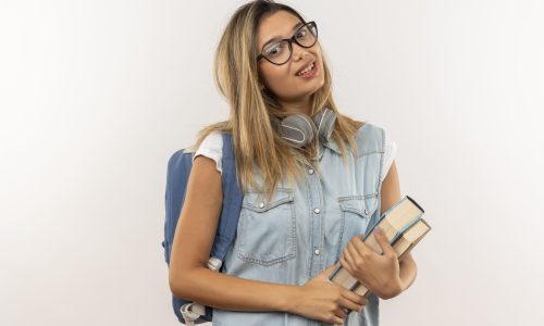 pleased young pretty student girl wearing glasses and back bag with headphones on neck holding books isolated on white background with copy space SSUCv3H4sIAAAAAAAACpyRz27DIAzG75P2DhHnRqJJ86d9lWoHB0iCSqECsmmq+u4zECrOu+Gf7c/+zPPzo6rIBE4ycqmeIcJYKrU5b8FLoxHTw86t0FzYkgguvbESVAkn8GzVcBcI9aZUwK+YJM6D35xwYdiOGHixoEaCb4m00TXFVU7EJHZgipBDwdw2RZZREv9XZ3p8ZTewCM1+48KFESuUgGTkmkrJ7ccLey+twcalKVx9GwYqFLSF0sNKJvVStBm/xivnNmY27W1Y4b05UcY8YFLhxDNqisxXcA7LeebFIIZ/au7FHG18NLCrEo4/EcJj25yG9jg2/XBuzm079ntB+r1Vok5cJwthzG6Sl9Zl2IDMdOw6oF3ds57Xp4HNNYxzX4+0o3RugAId8fCvPwAAAP//AwCQoWhehwIAAA==