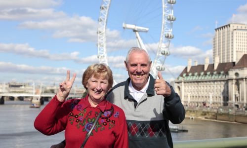 Senior couple in London with Millenium wheel in the background